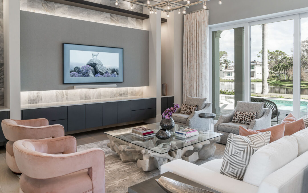 A coastal contemporary living room design with a blush palette, designed by Florida interior designer Brooke Meyer of Gulfshore Interior Design