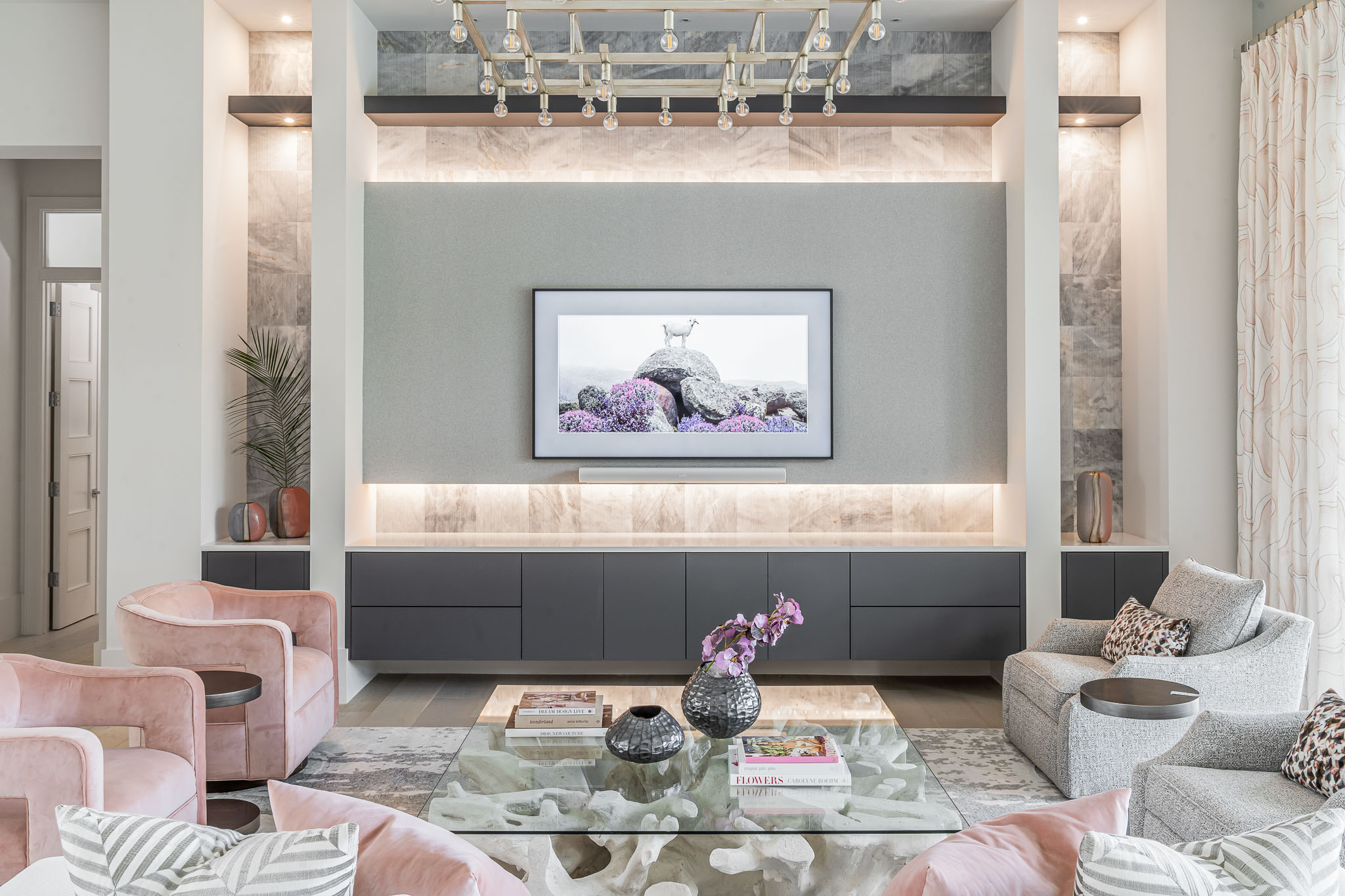 A coastal contemporary living room design with a blush palette, designed by Florida interior designer Brooke Meyer of Gulfshore Interior Design